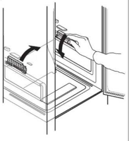 Line drawing of a hand inserting a component into a device (no text or symbols).