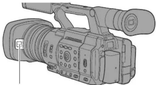 Line drawing of a professional video camera with lens and external frame (no text or symbols)