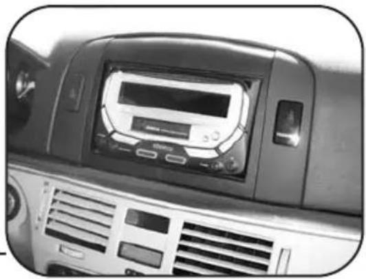 Close-up of a car front panel with control buttons and ventilation grilles (no visible text or symbols)