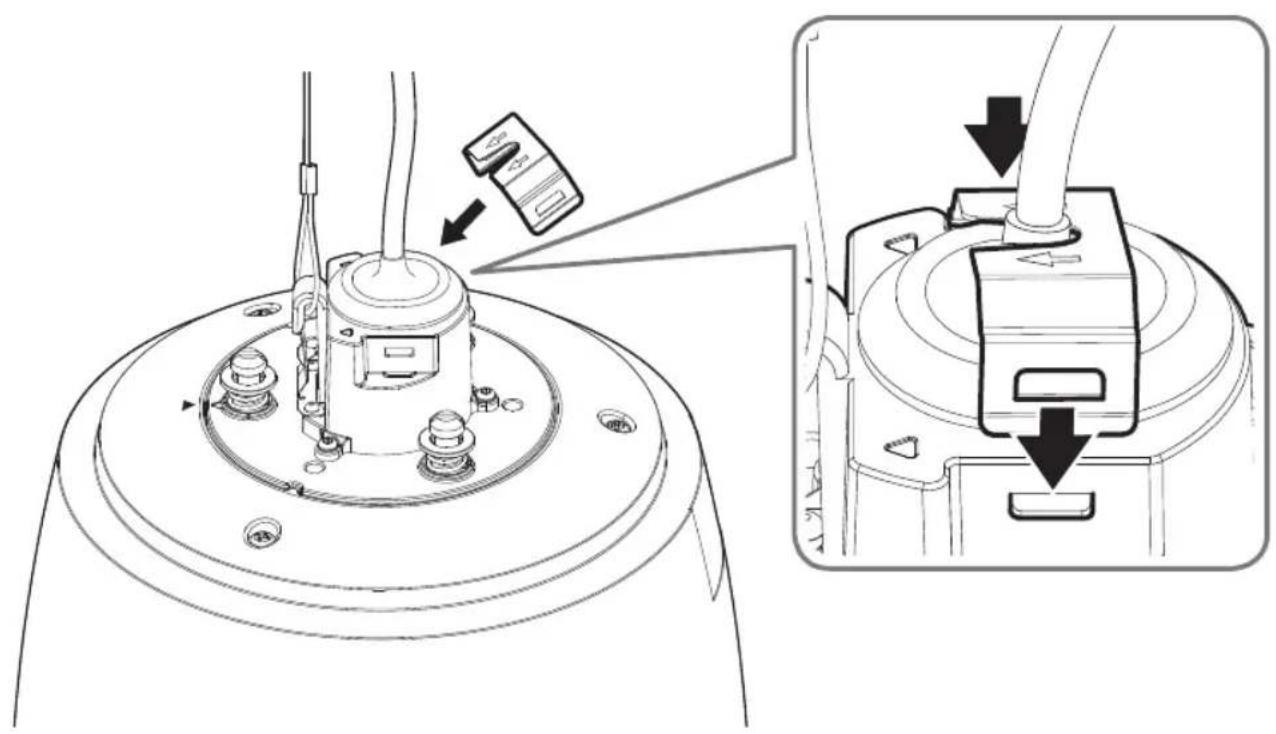 Technical diagram showing a device's internal components with directional arrows indicating assembly or adjustment, including a close-up of the main component.