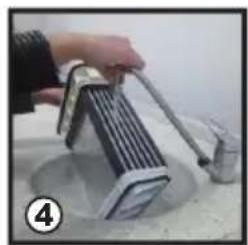 Hand using a tool to press or install a mechanical component, no visible text or symbols.