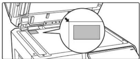 Diagram of a printer's internal structure with a magnified inset showing a rectangle and arrow (no text or symbols).