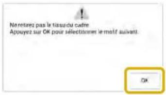 Ne retirez pas le tissu du cadre Appuyez sur OK pour sélectionner le motif suivant