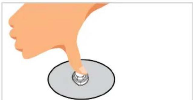 Illustration of a hand pressing a button on a circular surface (no text or symbols).