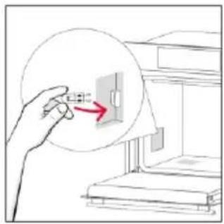 Illustration of a hand inserting a small component into a device (no text or symbols visible).