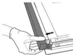 Hand holding a metal rod with a ruler (no visible text or symbols).