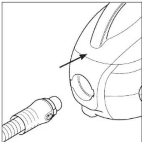 Line drawing of a helmet with a connector and a pointing arrow (no text or symbols)