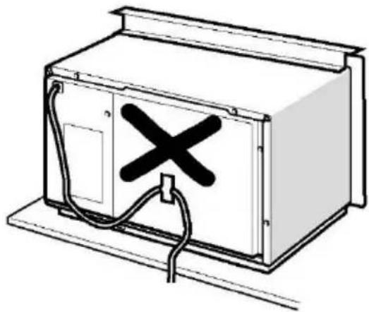 Line drawing of a cabinet with an X-shaped warning symbol on the door (no text or labels).