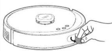 Line drawing of a hand holding a robotic vacuum cleaner (no text or symbols)
