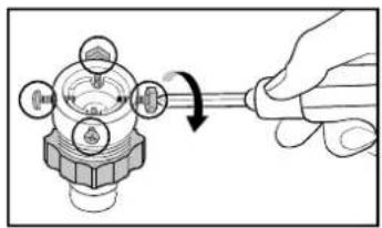 Hand holding a screwdriver interacting with a mechanical component (no text or symbols visible)