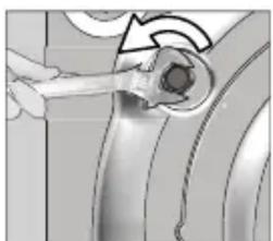 Close-up of a hand holding a wrench near a mechanical joint (no visible text or symbols).