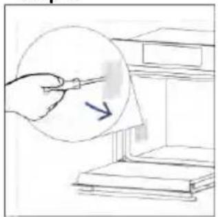 Hand holding a pen over a stack of books, with a magnified inset showing a pointing arrow (no text or symbols)