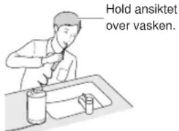 Hold ansiktet over vasken.