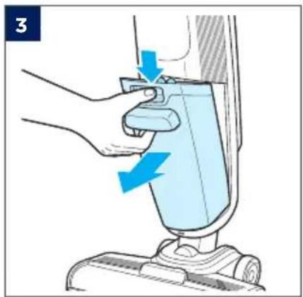 Illustration of a hand using a vacuum cleaner to lift a small blue object, with no text or symbols present.
