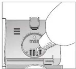Illustration of a hand inserting a component into a device.