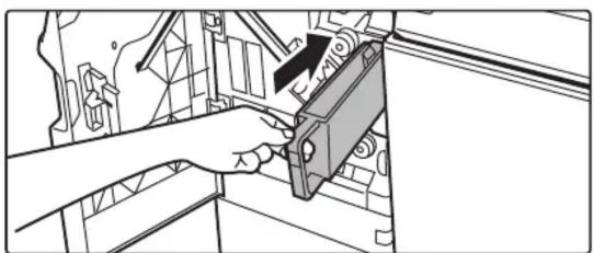 Mechanical assembly diagram showing a hand operating a clamp or bracket component (no text or symbols visible)