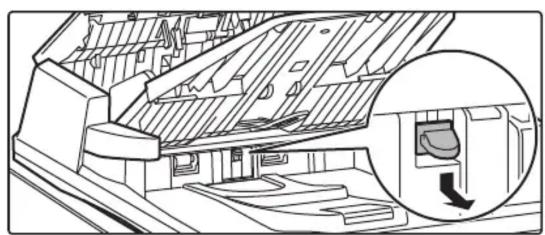 Architectural cross-section diagram showing roof structure and interior space with a magnified inset of a staircase (no text or symbols)