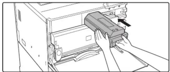 Illustration of hands inserting a device into a computer case (no text or symbols visible)