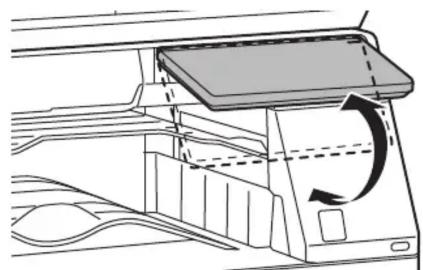 Diagram of a device interior showing airflow or movement with arrows indicating direction (no text or symbols)