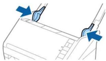 Technical diagram showing mechanical components with blue arrows indicating direction (no text or symbols)