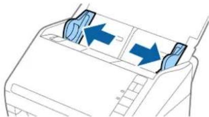 Diagram of a device interior showing two blue arrows pointing to a component, with no visible text or symbols.