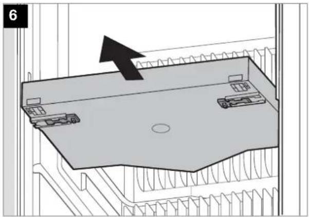 Diagram of a refrigerator interior showing a tray with drawers and a black arrow pointing to the lid (no text or symbols).