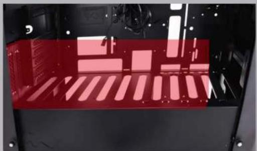 Interior view of a red industrial machine with visible structural components and wiring (no text or symbols)