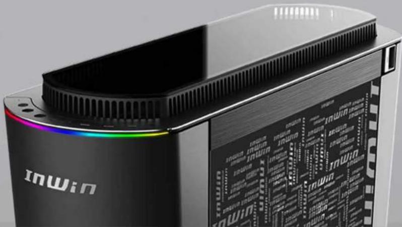 Exterior view of a black InWin device with a colorful display panel (no readable text or symbols on the device itself)