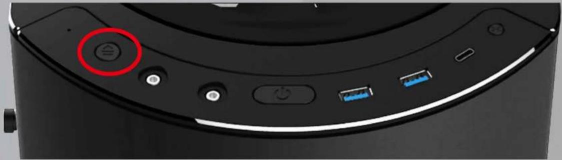 Close-up of a device's rear panel showing a red circular button and four connected ports (no text or symbols visible)