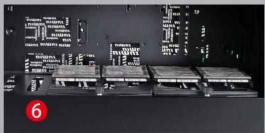 Black-and-white photo of electronic circuit boards with visible traces and components, no readable text or symbols