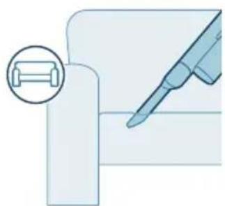 Illustration of a mechanical component with a magnified inset showing a cylindrical part (no text or symbols)