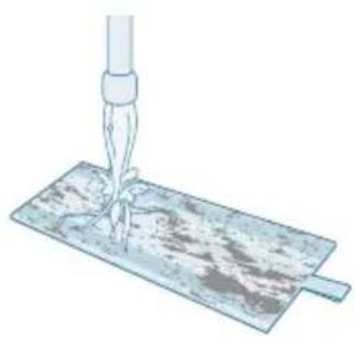 Illustration of a hand using a pipette to lift a metal sheet (no text or symbols).