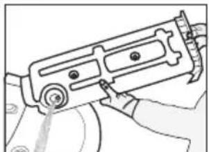 Line drawing of a hand holding a mechanical device with no visible text or symbols.