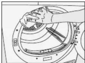 Line drawing of a hand cleaning a circular mechanical component (no text or symbols).