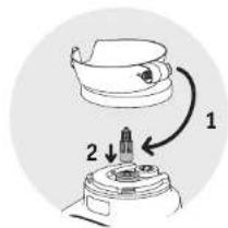 Diagram showing a mechanical assembly with labeled parts 1 and 2, likely illustrating a step in a process.