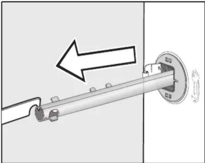 Mechanical assembly diagram showing a shaft inserted into a housing with a directional arrow indicating motion (no text or symbols).