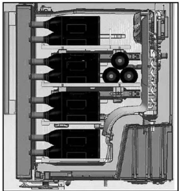 Technical cross-section diagram of an industrial machine or processing unit with multiple cylindrical components and piping, no visible text or labels.