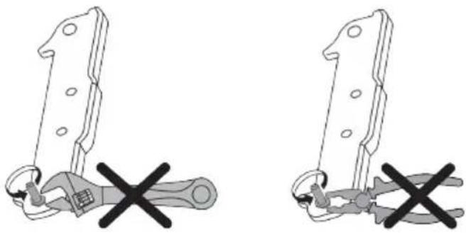 Two identical diagrams showing a mechanical clamp or bracket with a cross mark, no text or symbols present.