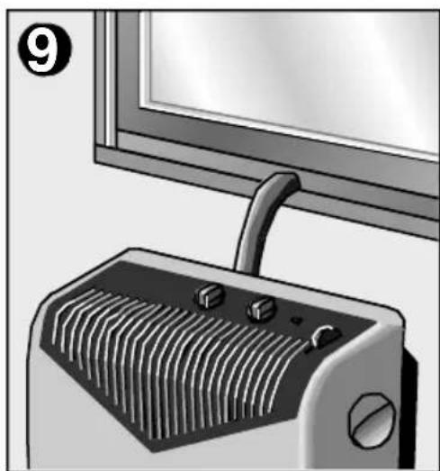 Illustration of a portable heater with a handle and control knob, next to a monitor (no text or symbols)