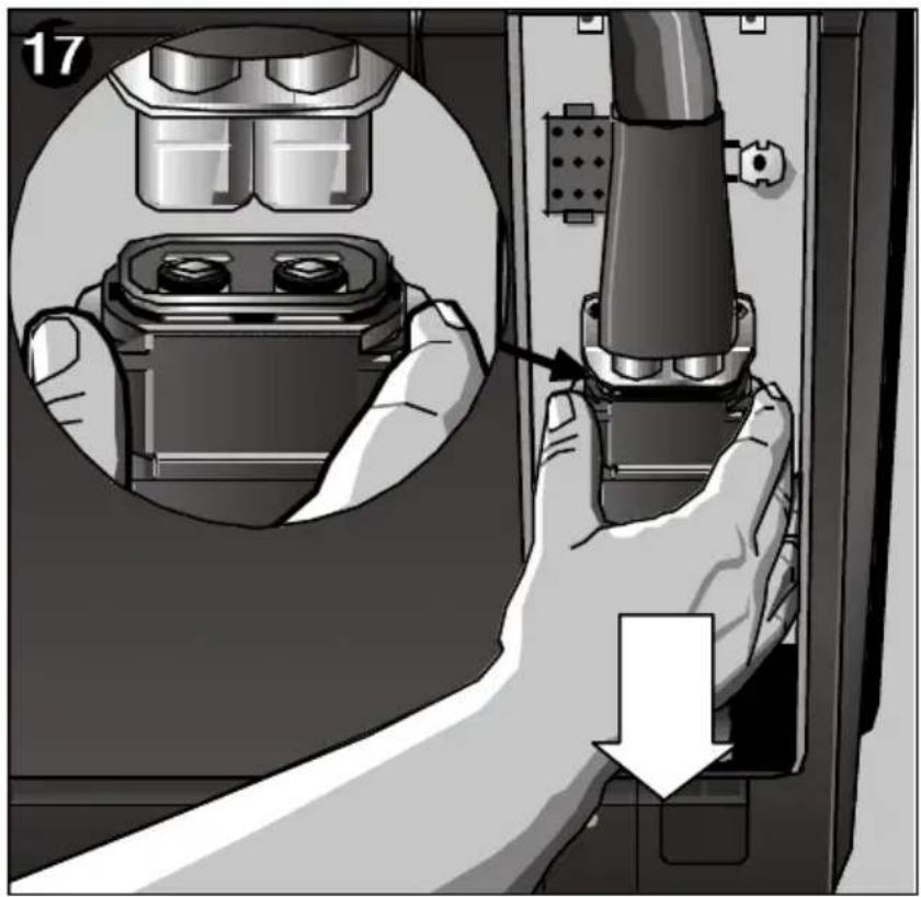 Illustration of a hand inserting a plug into an electronic device panel, showing internal components and a downward arrow. No text or symbols.