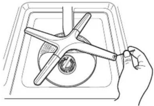 Line drawing of a hand holding a tool interacting with a circular component (no text or symbols).