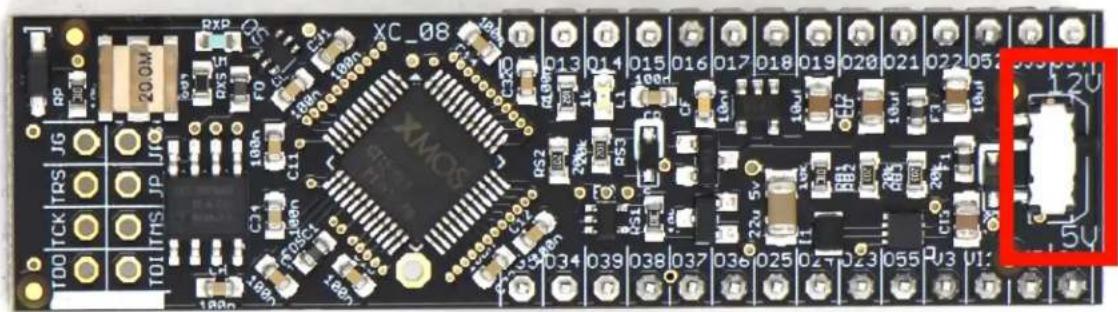 Close-up of a printed circuit board with various electronic components and connectors (no readable text or symbols)