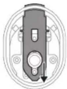 Mechanical component diagram showing a cylindrical assembly with mounting holes and a downward arrow indicating motion (no text or symbols)