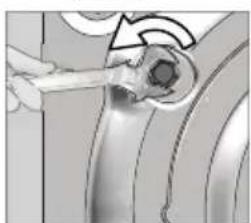 Close-up of a hand holding a tool interacting with a mechanical component (no visible text or symbols)