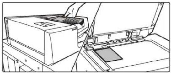 Line drawing of a printer's internal structure with a hand inserting a slot into the case (no text or symbols)