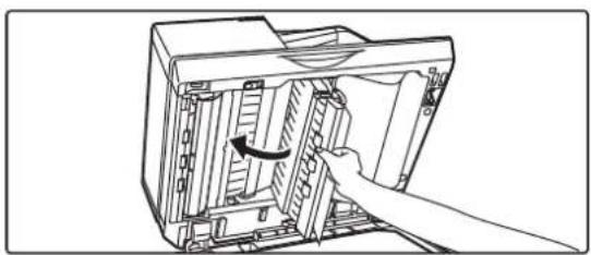 Diagram of a computer tower with an arrow indicating a component being inserted.