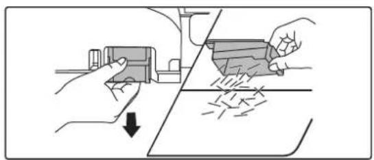 Illustration of hands using a tool to cut a surface with a downward arrow (no text or symbols).