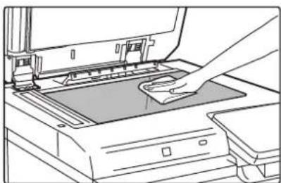 Line drawing of a printer's internal structure with a hand inserting a component.