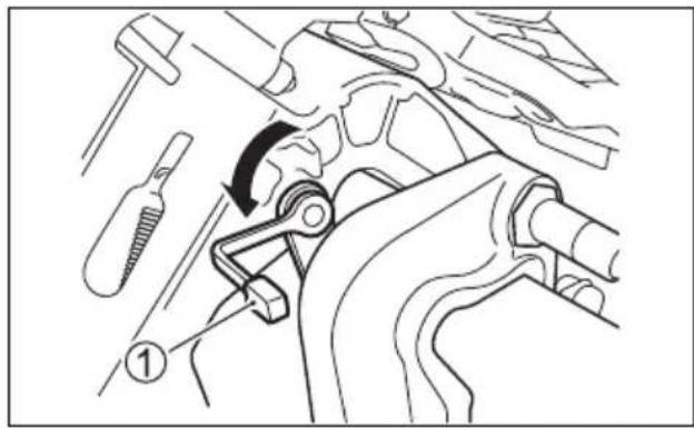 Technical diagram showing mechanical assembly steps with labeled parts and directional arrow