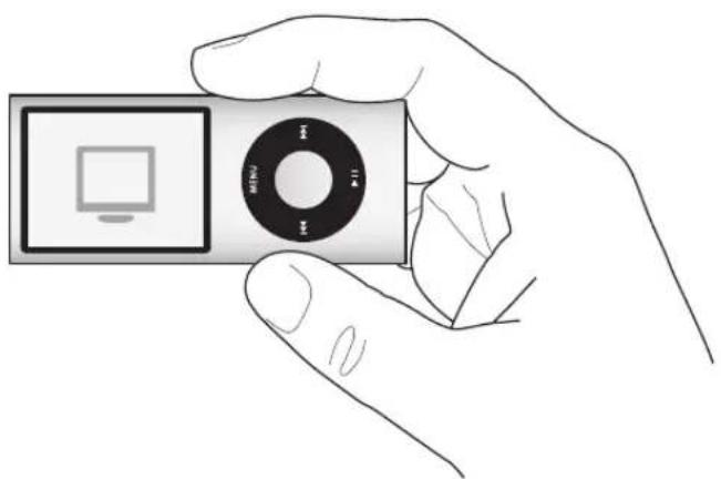 Hand holding a small electronic device with a screen showing a monitor icon (no text or symbols on the device body).